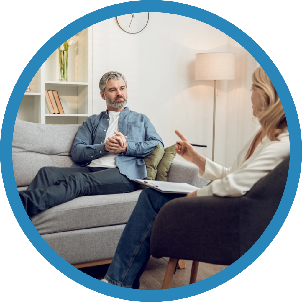 Behaviour Bridge practitioner listening to an NDIS participant to understand their support needs